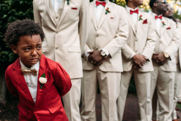 Boy crying mom wedding photographer