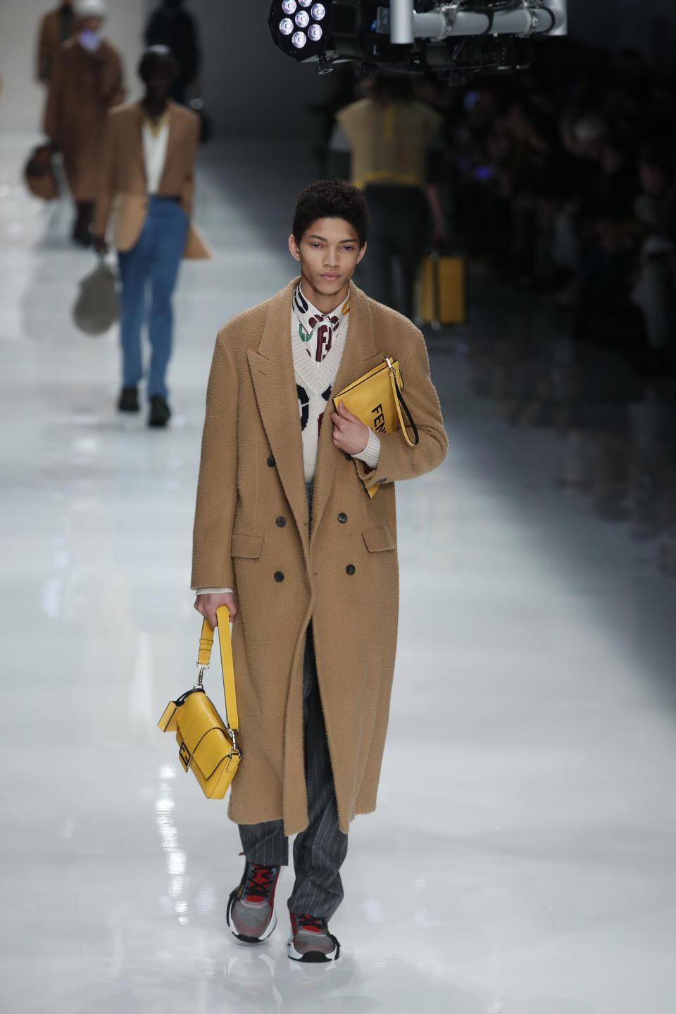 A model wears a creation as part of the Fendi men's Fall-Winter 2020/21 collection, that was presented in Milan, Italy, Monday, Jan. 13, 2020. (AP Photo/Antonio Calanni)