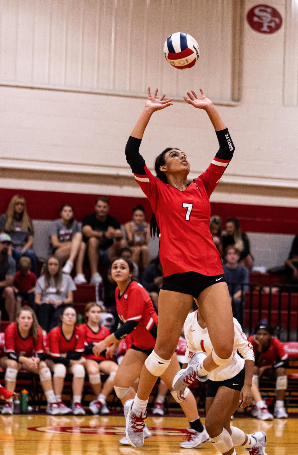 Santa Fe's Jalyn Stout (7) sets the ball against Florida State High School during their game in Alachua, on Thursday, Sept. 22, 2022.