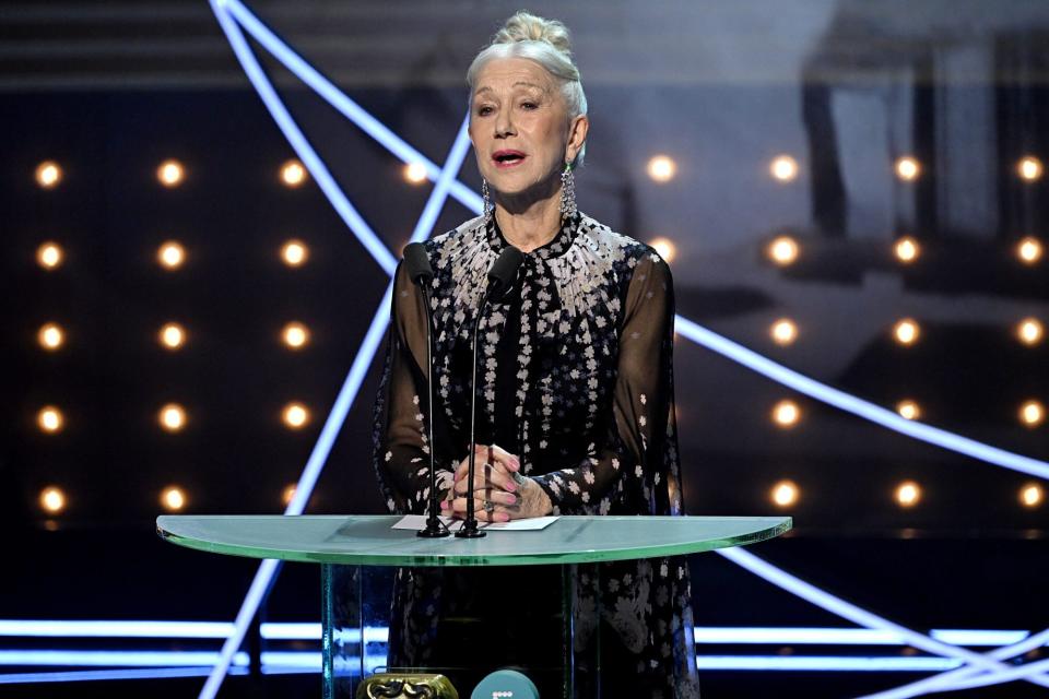 LONDON, ENGLAND - FEBRUARY 19: Dame Helen Mirren speaks on stage during the EE BAFTA Film Awards 2023 at The Royal Festival Hall on February 19, 2023 in London, England. (Photo by Stuart Wilson/BAFTA/Getty Images for BAFTA)