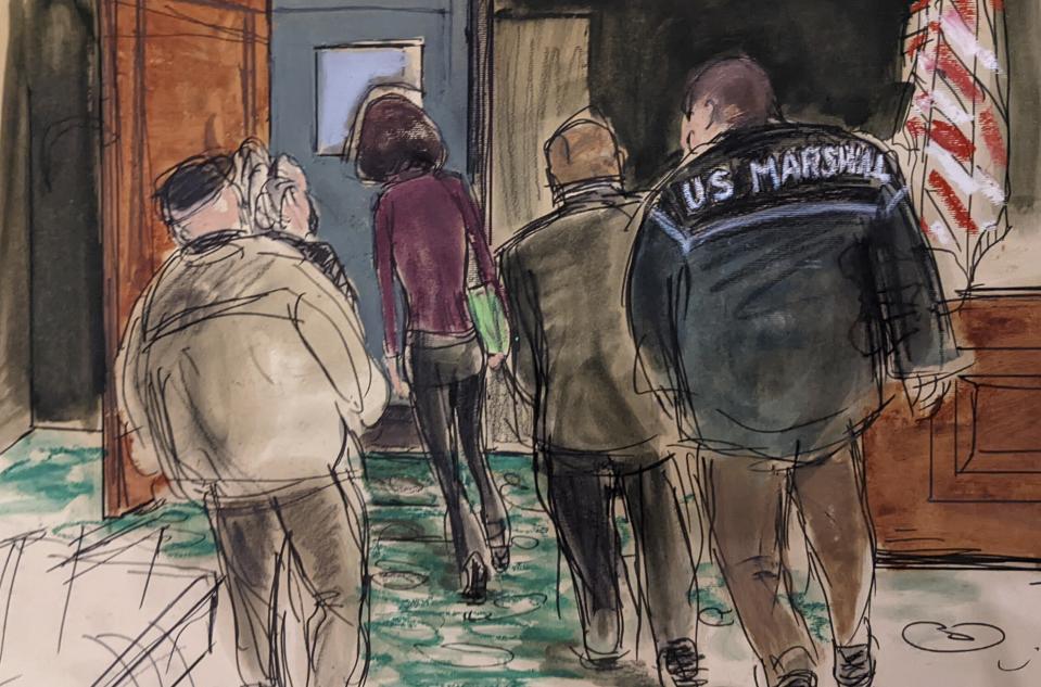 FILE - In this courtroom sketch, Ghislaine Maxwell, center, is led out of the courtroom into the lock up by four U.S. Marshals after a jury returned a guilty verdict in her sex trafficking trial, Wednesday Dec. 29, 2021, in New York. (Elizabeth Williams via AP, File)