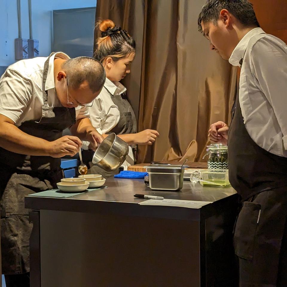 The kitchen team at Locus, plating.