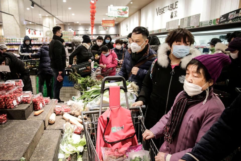 Wuhan residents in January last year preparing for a city-wide lockdown. Source: Getty