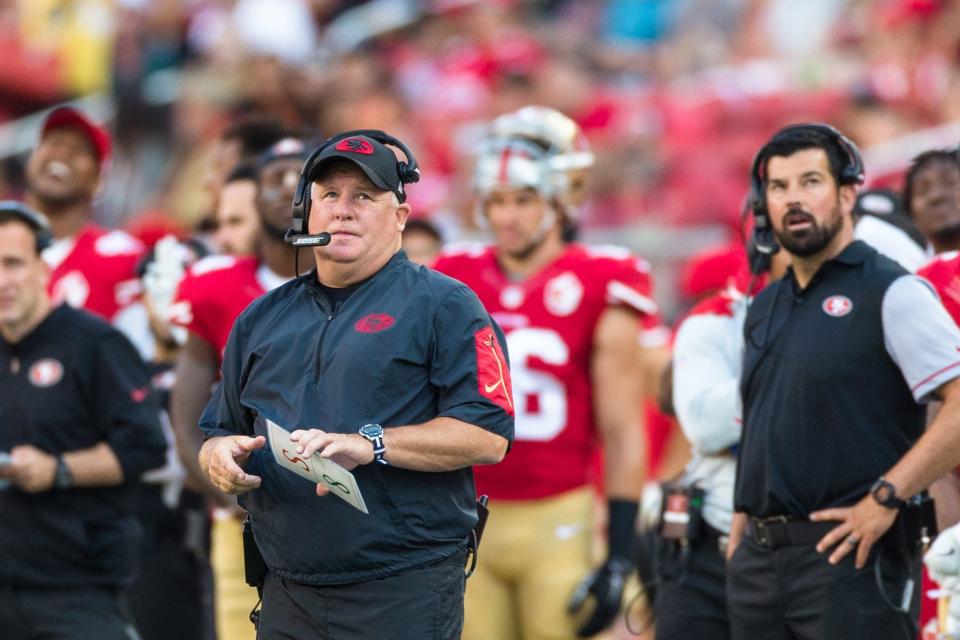 Chip Kelly hired Ryan Day (in background at far right) first with the Eagles and then the 49ers.