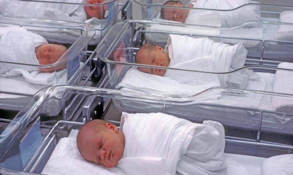 <span>Babies in a hospital nursery. In 2022 the fertility rate across England and Wales fell to 1.49 children per woman.</span><span>Photograph: Randy Duchaine/Alamy</span>