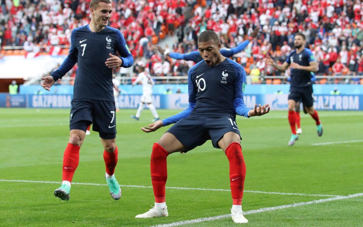 Kylian Mbappe celebrates after scoring the only goal of the game - AP