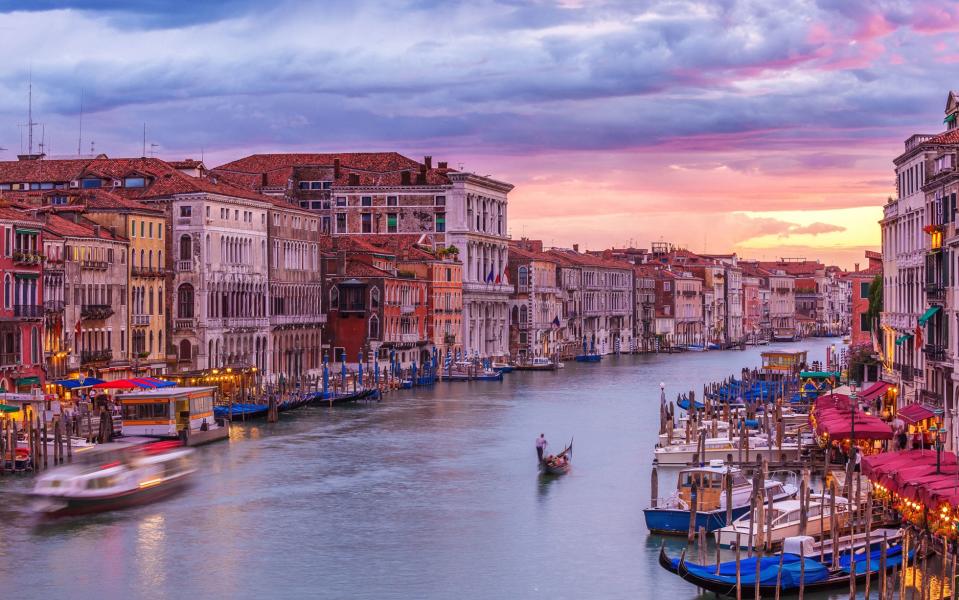 After arriving in Venice, cruise passengers can whizz away from the crowds on a water taxi - © 2015 Peter Zelei