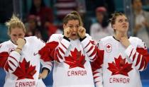 Ice Hockey - Pyeongchang 2018 Winter Olympics - Women's Gold Medal Final Match - Canada v USA - Gangneung Hockey Centre, Gangneung, South Korea - February 22, 2018 - Haley Irwin, Natalie Spooner and Emily Clark of Canada react in dejection after their defeat. REUTERS/Grigory Dukor