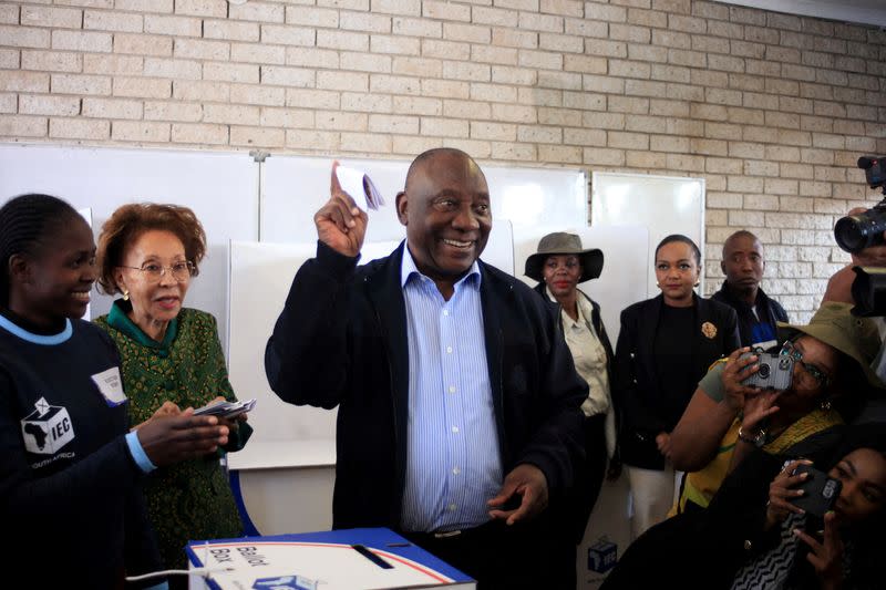 FILE PHOTO: South African president Cyril Ramaphosa votes in Soweto