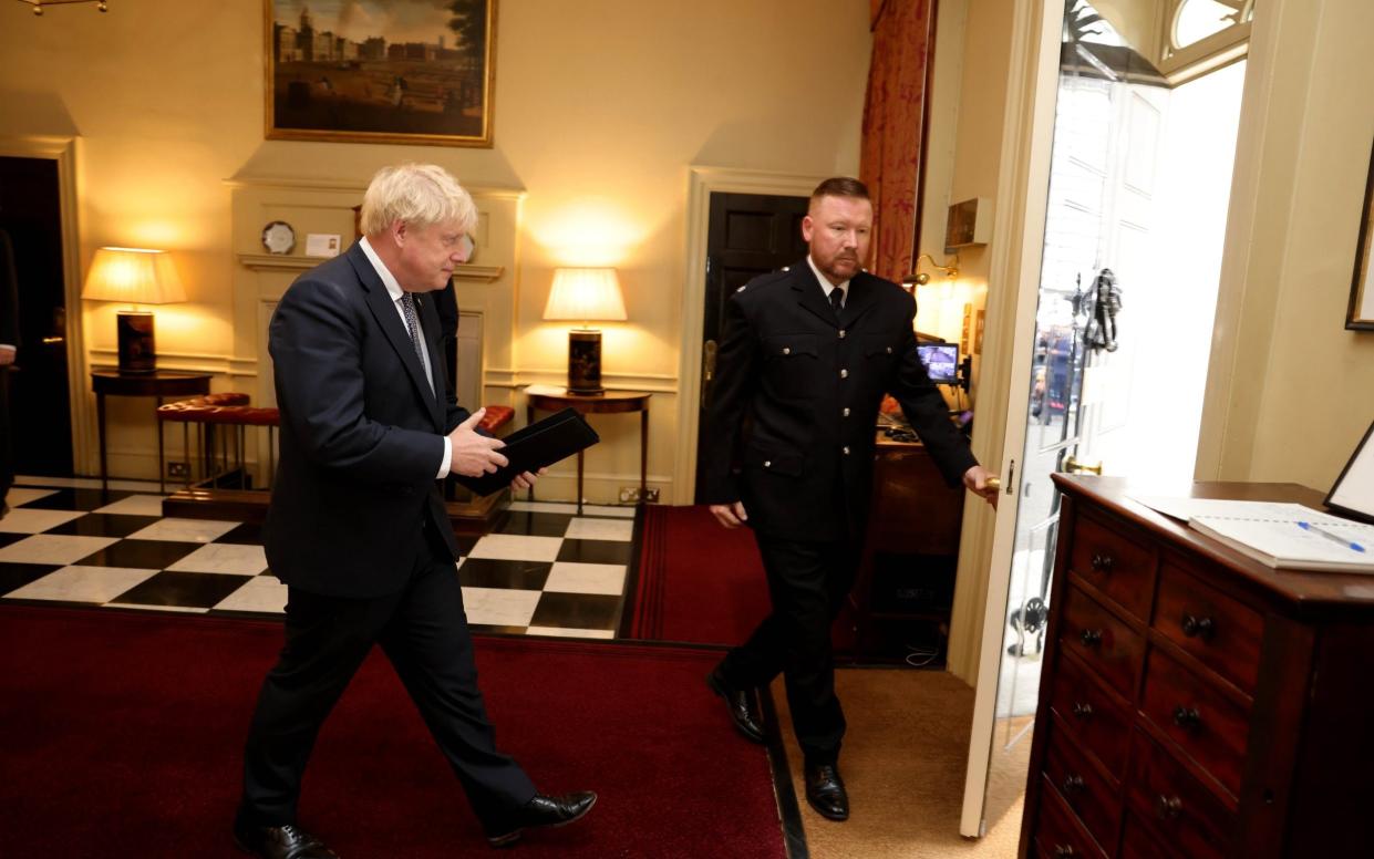 Boris Johnson in the hallway of No 10 before delivering his resignation speech - Andrew Parsons / No 10 Downing Street