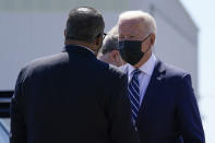 President Joe Biden greets Rep.-elect Troy Carter, D-La., upon arrival at Louis Armstrong New Orleans International Airport, Thursday, May 6, 2021, in Kenner, La. (AP Photo/Alex Brandon)