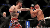 Georges St-Pierre fights Carlos Condit at UFC 154. (Courtesy Tracy Lee for Y! Sports)