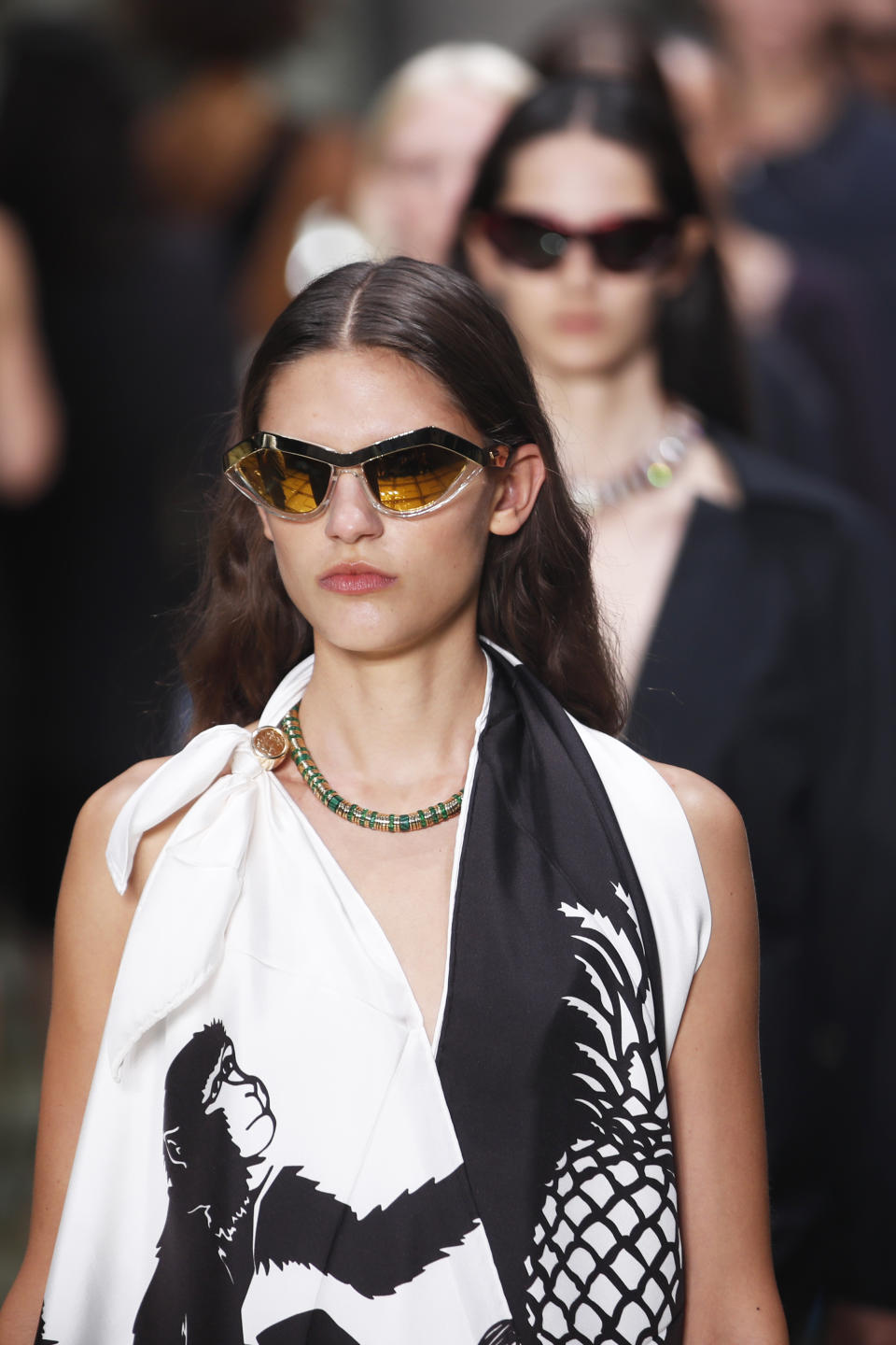 Models wear creations as part of the Bottega Veneta Spring-Summer 2020 collection, unveiled during the fashion week, in Milan, Italy, Thursday, Sept. 19, 2019. (AP Photo/Antonio Calanni)