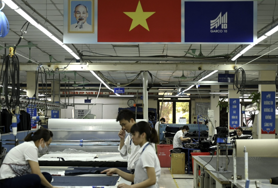 Zu den chinesischen Unternehmen, die sich in Vietnam niedergelassen haben, gehört zum Beispiel Growatt, ein Energiespeicherunternehmen. - Copyright: Manan Vatsyayana / AFP