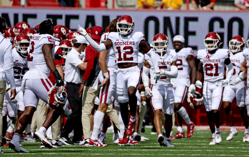 Sept. 17, 2022; Lincoln, Nebraska; Oklahoma Sooners defensive back Key Lawrence (12) reacts after making an interception during the second half against the Nebraska Cornhuskers at Memorial Stadium. Kevin Jairaj-USA TODAY Sports