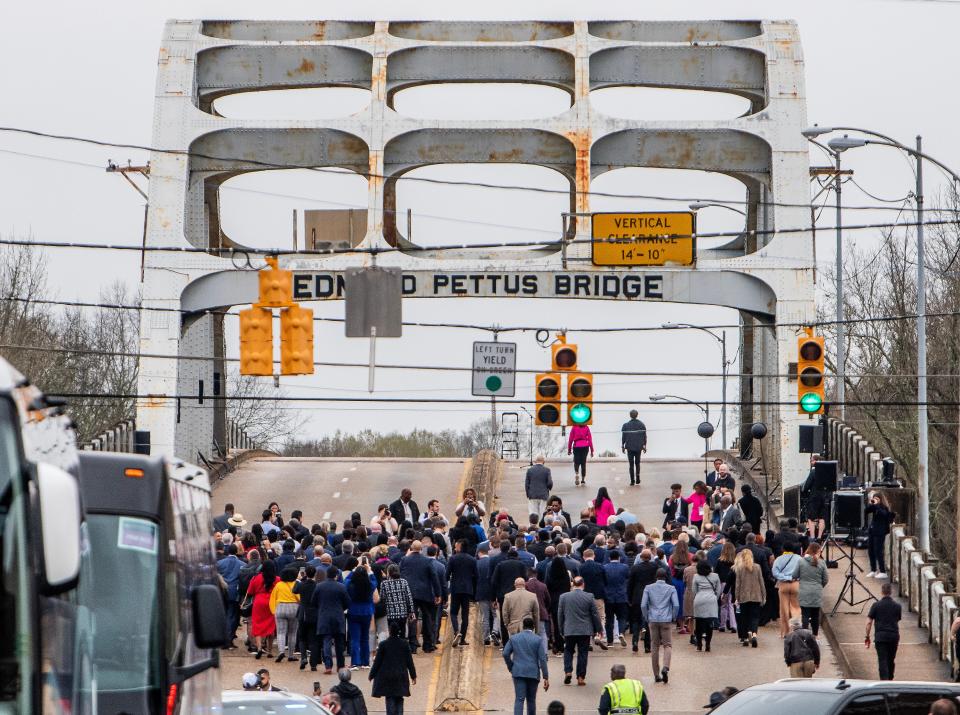 The Annual Faith and Politics Civil Rights Pilgrimage makes a stop on the Edmund Pettus Bridge in Selma, Ala., on Saturday March 2, 2024