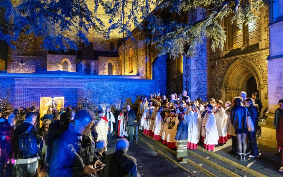 The choir and congregation assemble outside after the alarm