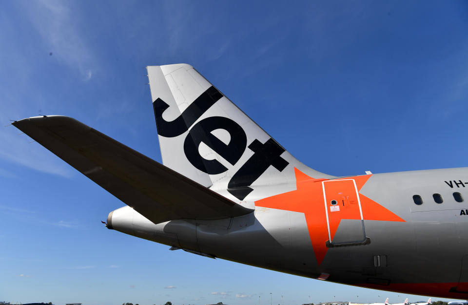 Grounded Jetstar Airways aircraft are seen parked at Brisbane Airport in Brisbane, Tuesday, April 7, 2020. 