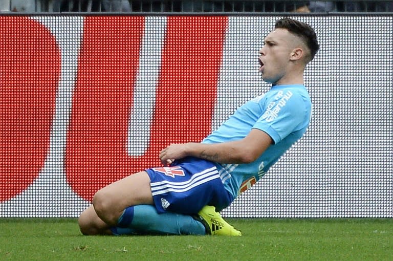 Marseille's forward Lucas Ocampos celebrates after scoring a goal during the French L1 football match between Nantes and Olympique de Marseille on August 12, 2017 at the Beaujoire stadium of Nantes, western France