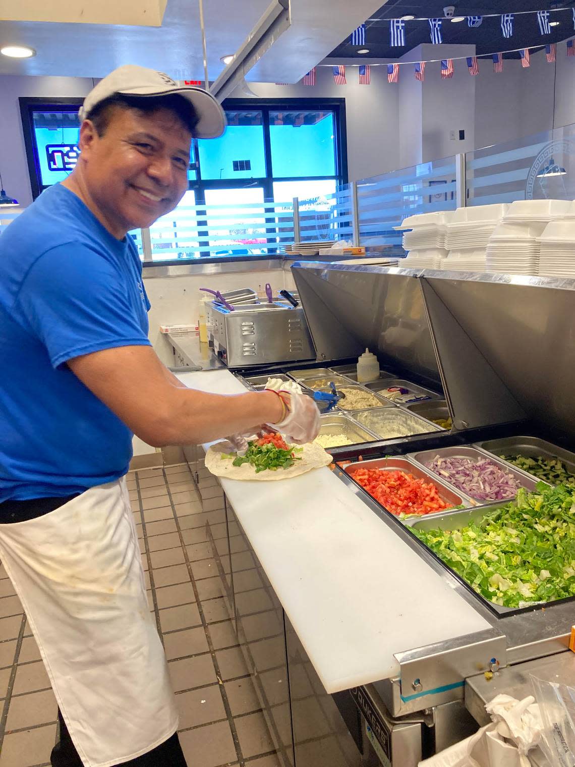 Nabor Gutierrez prepares food at Olympia Gyros at 670 Lake Joy Road, Suite 150, in Warner Robins. He is the chef, manager and owner of the new restaurant.