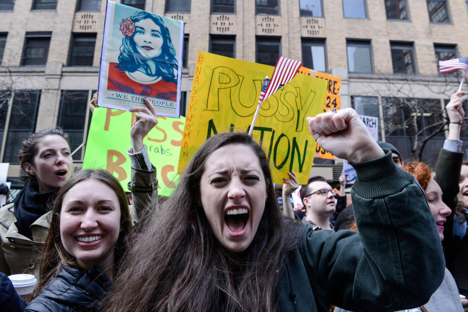 People participate in a Women's March to protest Trump in New York City, Jan. 21, 2017.