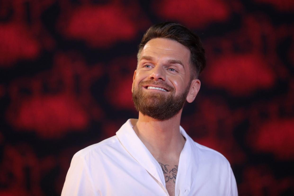 French singer Kevin Bonnet aka 'Keen'V' poses on the red carpet prior the 23st NRJ Music Awards ceremony at the Palais des Festivals in Cannes, south-eastern France, on November 20, 2021. (Photo by Valery HACHE / AFP) (Photo by VALERY HACHE/AFP via Getty Images)