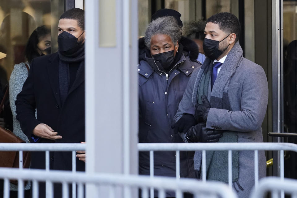Actor Jussie Smollett, right, departs with his mother Janet, from the Leighton Criminal Courthouse, Wednesday, Dec. 8, 2021, in Chicago, after Cook County Judge James Linn gave the case to jury. (AP Photo/Nam Y. Huh)