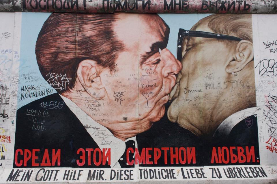 Vrubel's mural depicting Leonid Brezhnev kissing Erich Honecker - Richard Baker/ In Pictures Ltd./Corbis via Getty Images