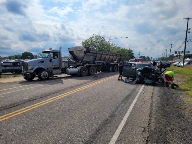 A Cleveland Heights woman was killed after her car, shown at right, went across the center line and crashed head on into a semi-truck on Route 14 near Portage Pointe Drive in Streetsboro on Saturday afternoon. A Deerfield man died in a single-vehicle crash on Route 14 in Deerfield early Sunday morning.