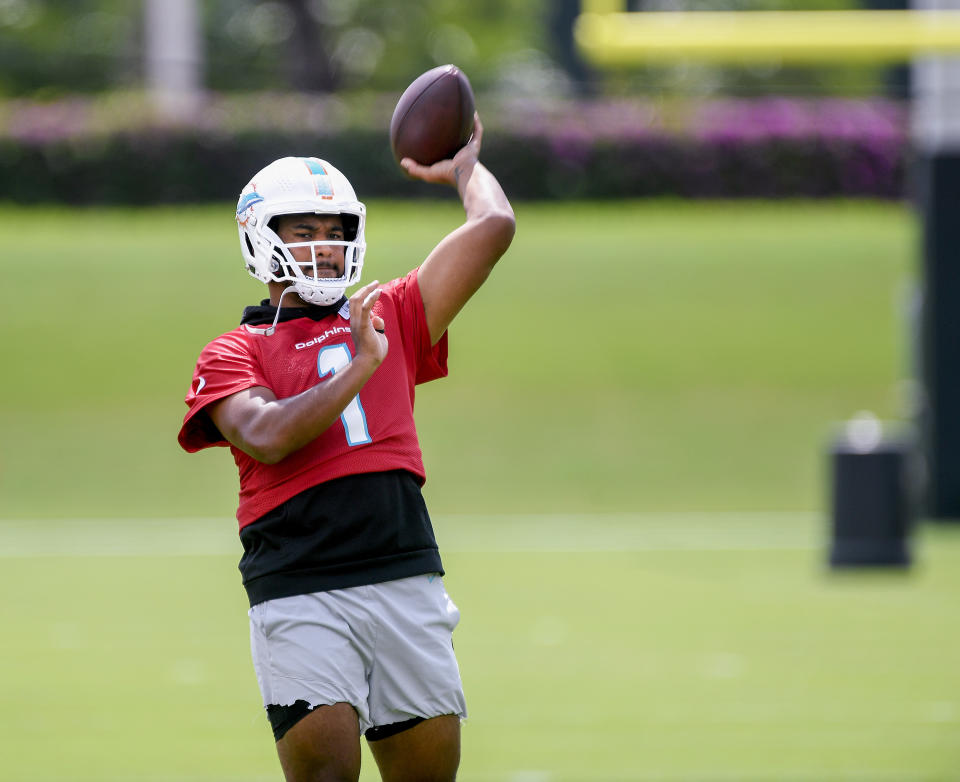 Miami Dolphins quarterback Tua Tagovailoa throws a pass during practice at the NFL football team's training facility, Wednesday, June 7, 2023, in Miami Gardens, Fla. (AP Photo/Michael Laughlin)