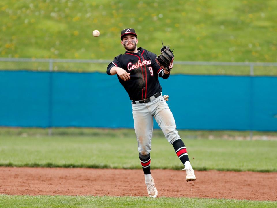 Coby Moore throws out a runner at first base during Coshocton's 4-1 loss to host West Muskingum on Wednesday in Falls Township. The Tornadoes improved to 5-2 overall.