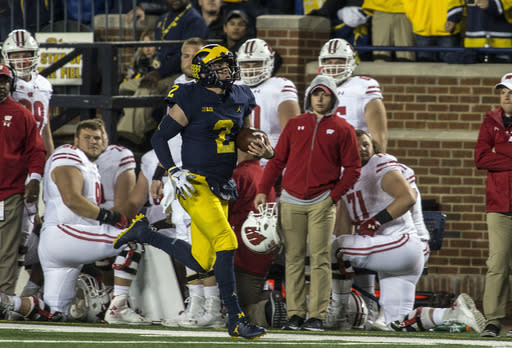 Michigan ran away from Wisconsin in Week 7. (AP Photo/Tony Ding)