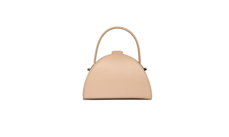 <p>Mlouye was founded by Meb Rure, a former furniture designer from Turkey. She has slowly gained traction within the fashion community for her artful, sculptural handbags.<br><br>Pandora Bag, $495, champagne, <a rel="nofollow noopener" href="https://www.mlouye.com/collections/all/products/pandora-bag-champagne" target="_blank" data-ylk="slk:mlouye.com;elm:context_link;itc:0;sec:content-canvas" class="link ">mlouye.com</a> </p>