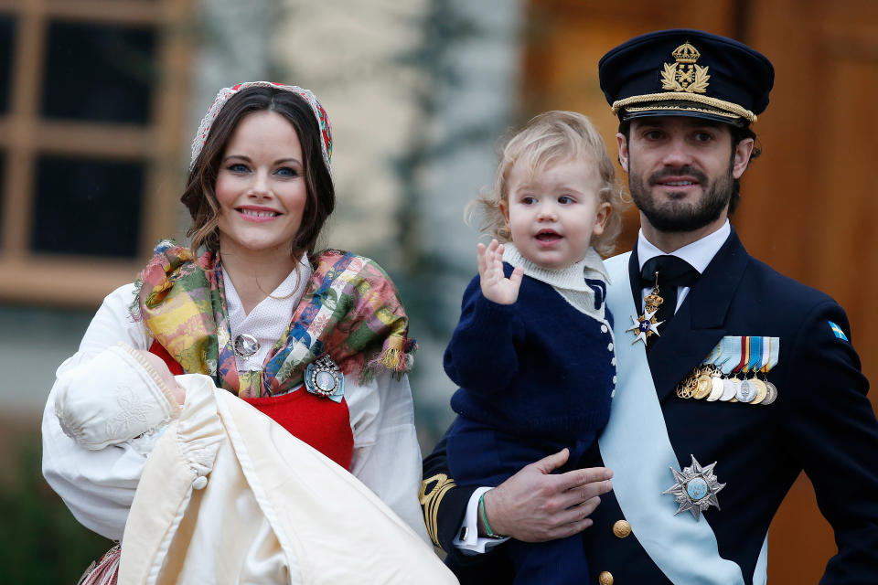 Prince Gabriel of Sweden, Duke of Dalarna held by Princess Sofia of Sweden and Prince Carl Philip 