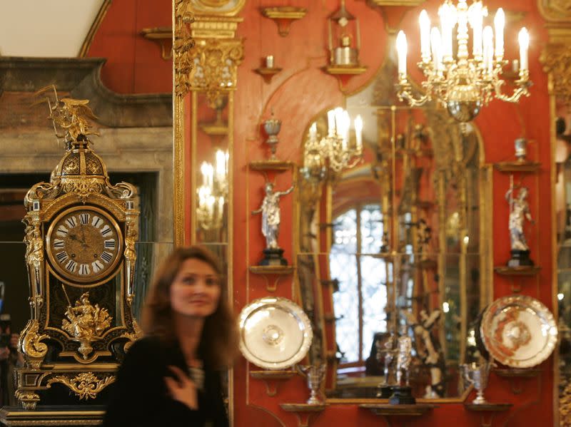 FILE PHOTO: A visitor looks at exhibits at the Gruenes Gewoelbe (Green Vault) at the Royal Palace in Dresden