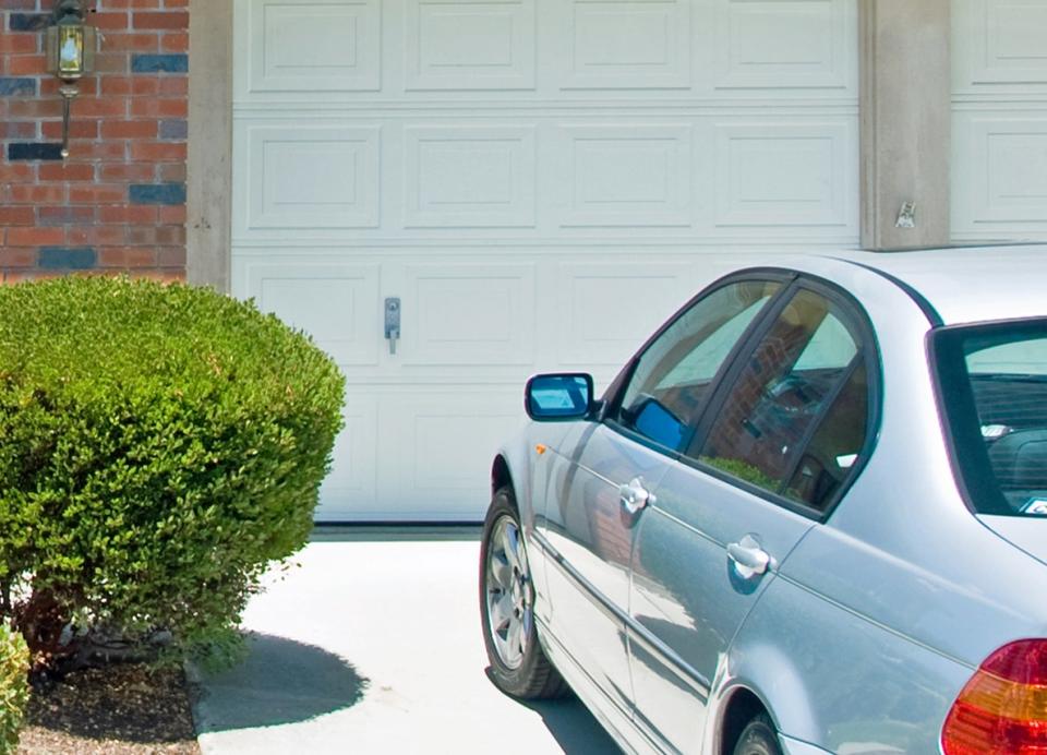 car parked in home driveway