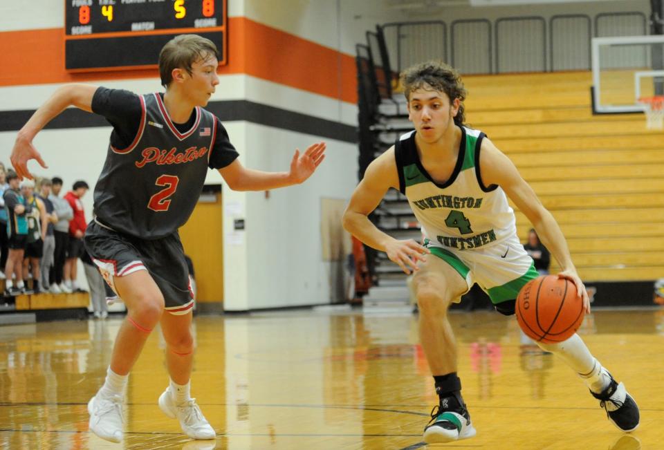 Huntington's Wes Brown (#4) drives toward the paint during a game against Piketon on Feb. 7, 2023. Brown ended the game with 10 points as the Huntsmen lost to the Redstreaks 75-67.