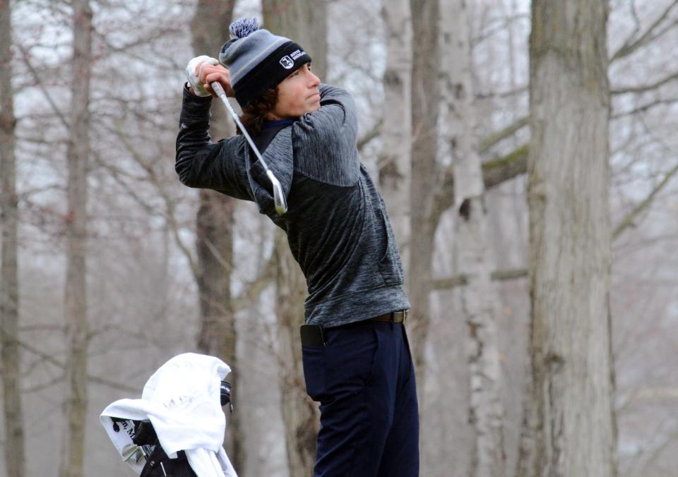 Petoskey's Max Faulkner follows his tee shot on hole No. 6 during Monday's round at the Petoskey-Bay View Country Club.