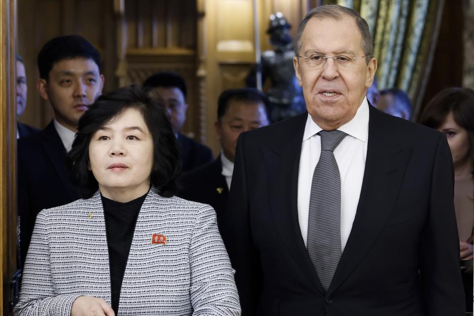 Russian Foreign Minister Sergey Lavrov, right, and North Korean Foreign Minister Choe Son Hui enter a hall for their talks in Moscow, Russia, Tuesday, Jan. 16, 2024. (Maxim Shemetov/Pool Photo via AP)