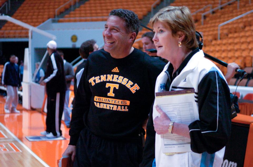 Tennessee basketball coaches Bruce Pearl and Pat Summitt say hello as the men's team enters the court for a walk through before the game against Auburn in 2006.