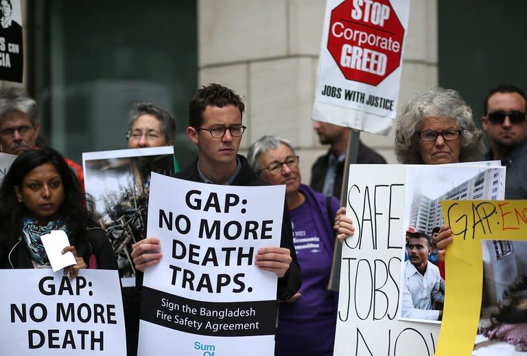 Protestors stand outside of the Gap Inc. headquarters on April 25, 2013 in San Francisco, California. The United States said Western brands buying clothing from Bangladesh had a "critical role" in improving conditions in the sector, even as leading US retailers refuse to sign a new safety pact