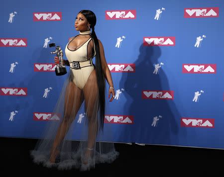 2018 MTV Video Music Awards - Photo Room - Radio City Music Hall, New York, U.S., August 20, 2018. - Rapper Nicki Minaj poses backstage with her Best Hip-Hop Video award for "Chun-Li." REUTERS/Carlo Allegri