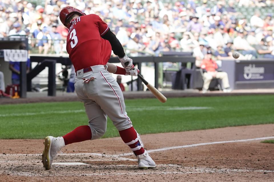 Philadelphia Phillies' Bryce Harper hits a home run during the seventh inning of a baseball game against the Milwaukee Brewers Thursday, June 9, 2022, in Milwaukee. (AP Photo/Morry Gash)