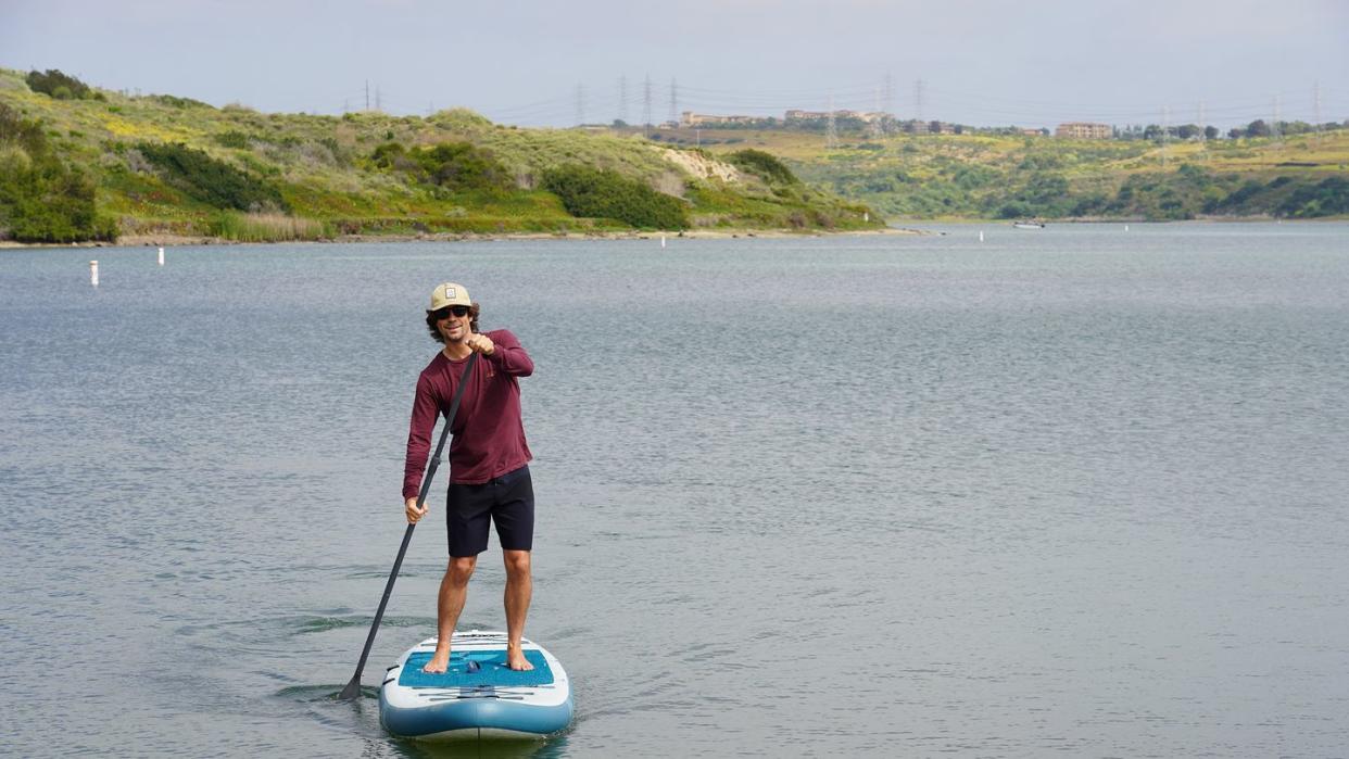 a man on a paddle board