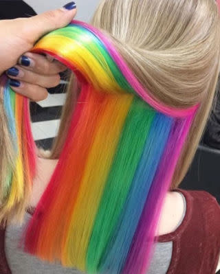 <p>Pioneered by Shoreditch hair salon Not Another Salon, the hidden rainbow is the ideal way to get your pastel hair on whilst staying safe for work. </p><p>Also, it's just the most fun we've ever seen. One moment you're a blonde, the next you're a unicorn. The dream.</p>