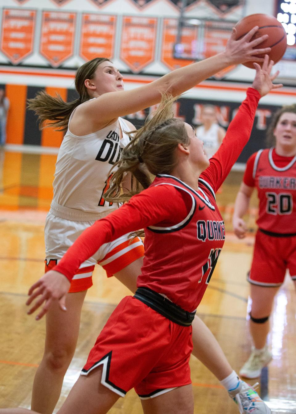 Marlington's Chelsea Evanich fights Salem's Abbie Davidson for a second-half rebound, Wednesday, Jan. 25, 2023.