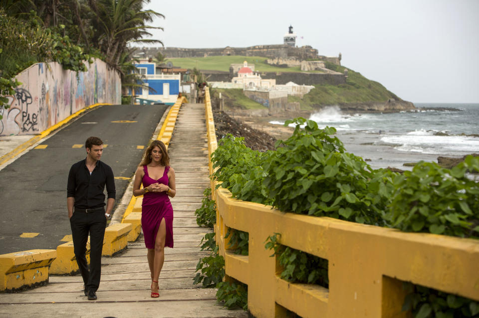 This image released by 20th Century Fox shows Justin Timberlake, left, and Gemma Arterton in a scene from "Runner Runner." (AP Photo/20th Century Fox, Scott Garfield)