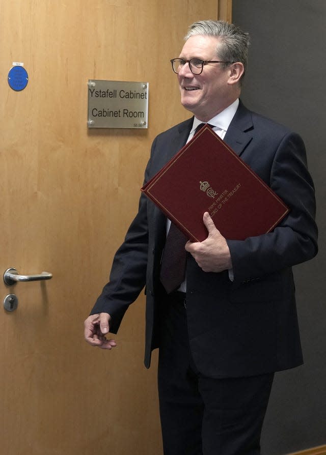 Prime Minister Sir Keir Starmer arrives to meet First Minister of Wales Vaughan Gething, in the cabinet room at the Senedd, Cardiff 