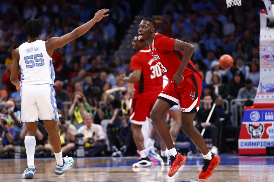 Mar 16, 2024; Washington, D.C., USA; North Carolina State Wolfpack forward Mohamed Diarra (23) reacts against the North Carolina Tar Heels during the first half at Capital One Arena. Mandatory Credit: Amber Searls-USA TODAY Sports