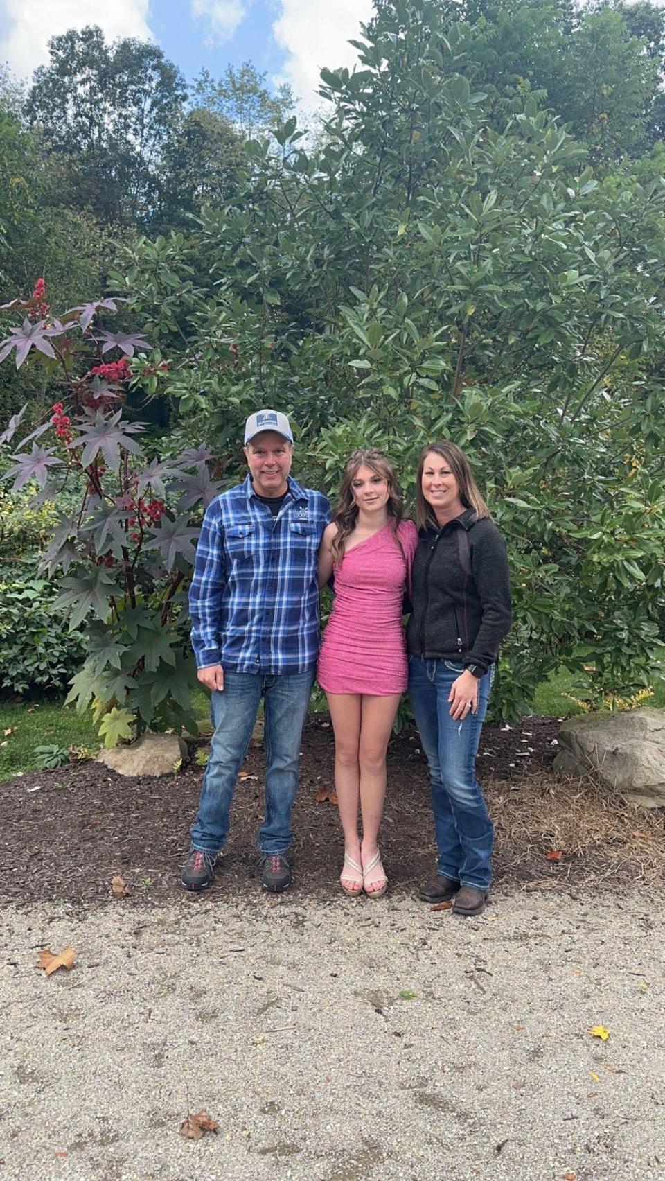 Katelyn N. Owens is shown with her parents Mike and Erika Owens. Katelyn, 15, died in Tuesday's fiery bus crash that claimed the lives of six people, including two other students from Tuscarawas Valley High School and three adults.
